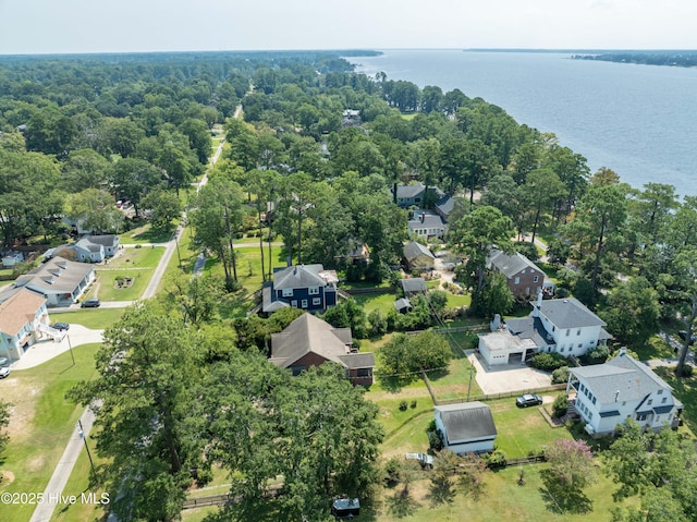 drone / aerial view featuring a water view and a residential view