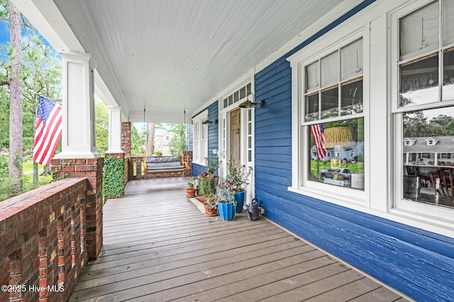 deck featuring a porch