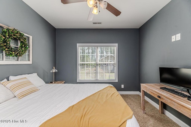bedroom with carpet floors, baseboards, and ceiling fan