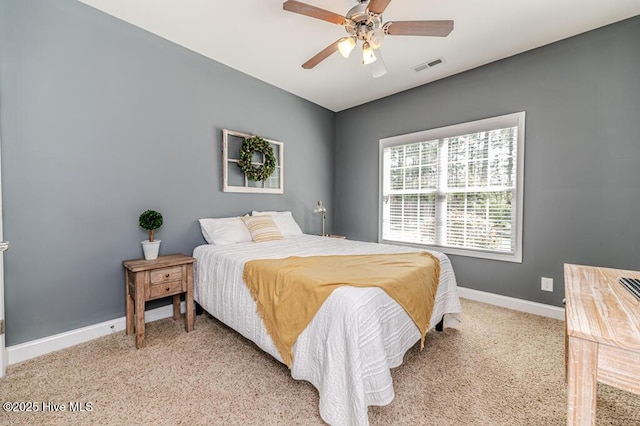 bedroom with baseboards, light carpet, and ceiling fan