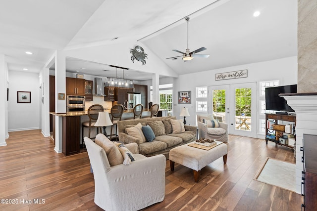 4145 Brighton Ln, Southport, NC 28461 - living area with french doors, hardwood / wood-style floors, recessed lighting, a ceiling fan, and baseboards