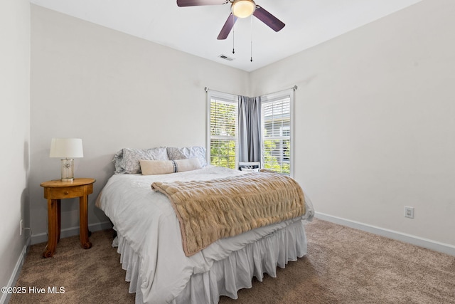 4145 Brighton Ln, Southport, NC 28461 - carpeted bedroom with ceiling fan, baseboards, and visible vents