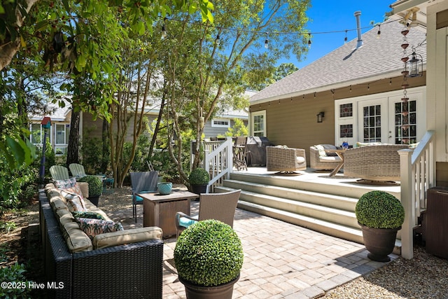 4145 Brighton Ln, Southport, NC 28461 - view of patio / terrace with an outdoor living space, a wooden deck, and french doors