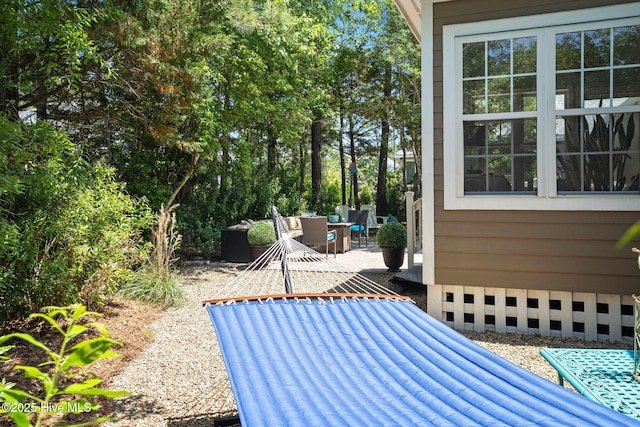 4145 Brighton Ln, Southport, NC 28461 - view of patio featuring an outdoor living space