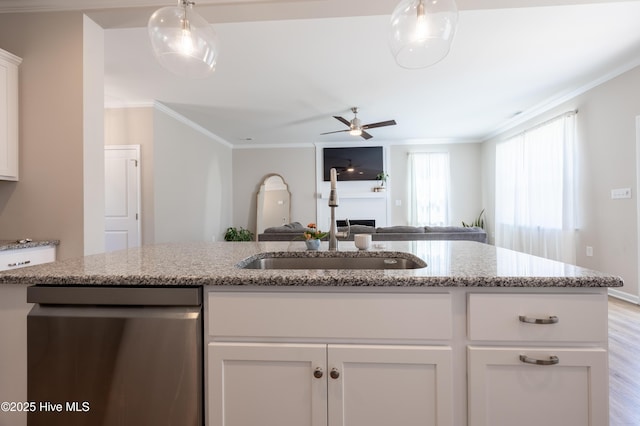 4524 Sweet Williams Ln NW, Wilson, NC 27896 - kitchen with dishwasher, a sink, open floor plan, crown molding, and white cabinets