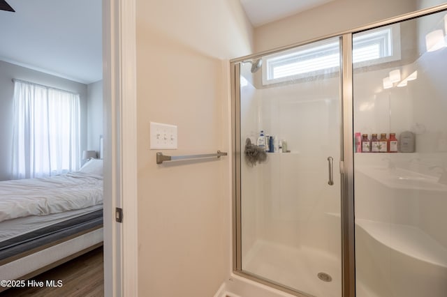 4524 Sweet Williams Ln NW, Wilson, NC 27896 - ensuite bathroom featuring a shower stall, ensuite bath, and wood finished floors