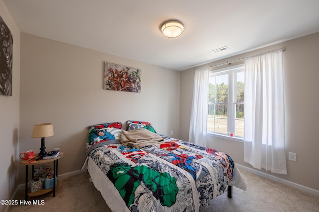 4524 Sweet Williams Ln NW, Wilson, NC 27896 - bedroom with carpet flooring, visible vents, and baseboards