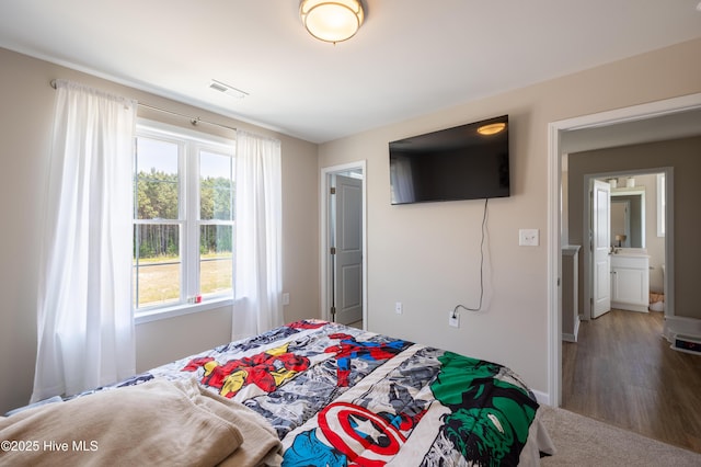 4524 Sweet Williams Ln NW, Wilson, NC 27896 - bedroom with baseboards and visible vents