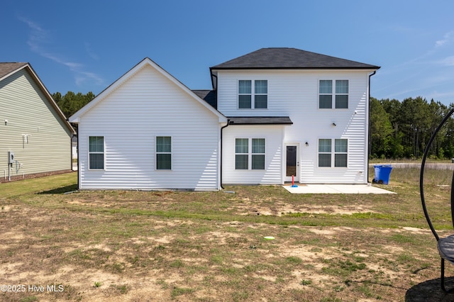 4524 Sweet Williams Ln NW, Wilson, NC 27896 - rear view of property with a yard, a patio, and roof with shingles