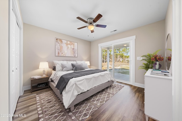 1191 Pierce Rd, Southport, NC 28461 - bedroom with wood finished floors, baseboards, visible vents, and access to exterior