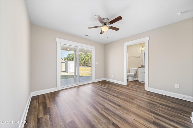 1191 Pierce Rd, Southport, NC 28461 - unfurnished bedroom with baseboards, access to outside, visible vents, and dark wood-style floors