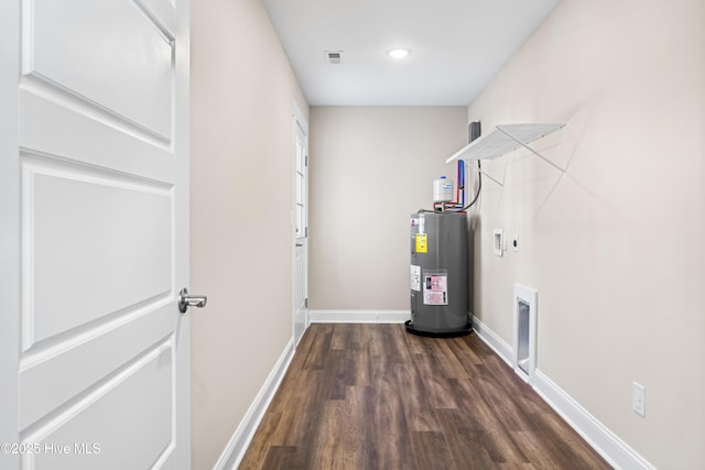 1191 Pierce Rd, Southport, NC 28461 - utility room featuring electric water heater
