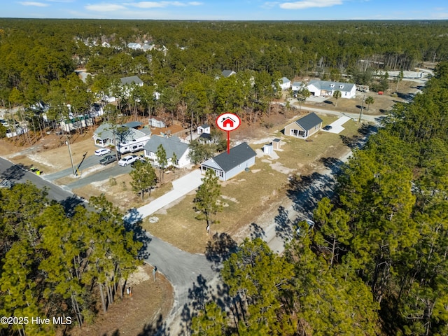 1191 Pierce Rd, Southport, NC 28461 - aerial view featuring a forest view