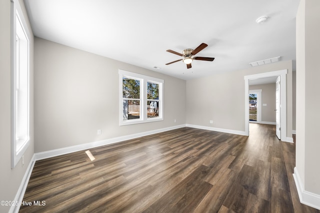 1191 Pierce Rd, Southport, NC 28461 - unfurnished room featuring baseboards, ceiling fan, visible vents, and dark wood-style floors