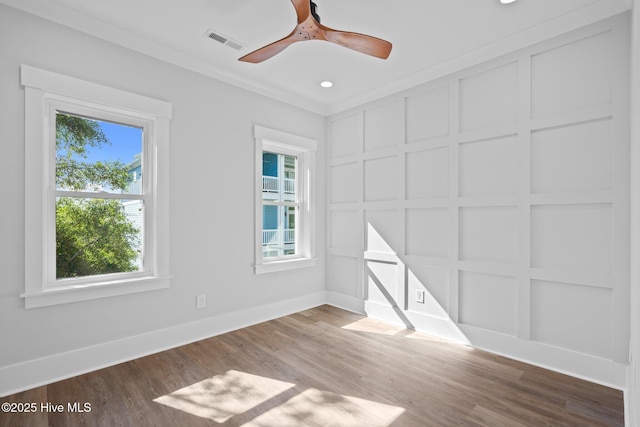 unfurnished room with recessed lighting, ceiling fan, visible vents, crown molding, and wood finished floors