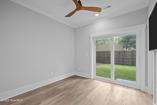 spare room featuring recessed lighting, baseboards, ceiling fan, visible vents, and wood finished floors