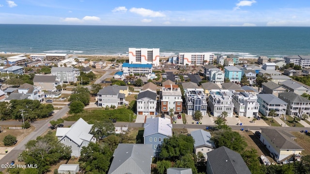 birds eye view of property featuring a water view and a residential view