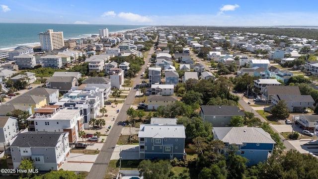 birds eye view of property featuring a water view and a residential view