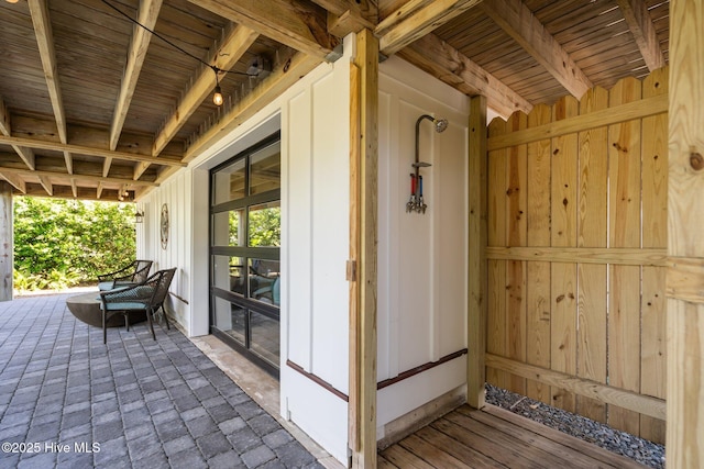 entrance to property featuring board and batten siding
