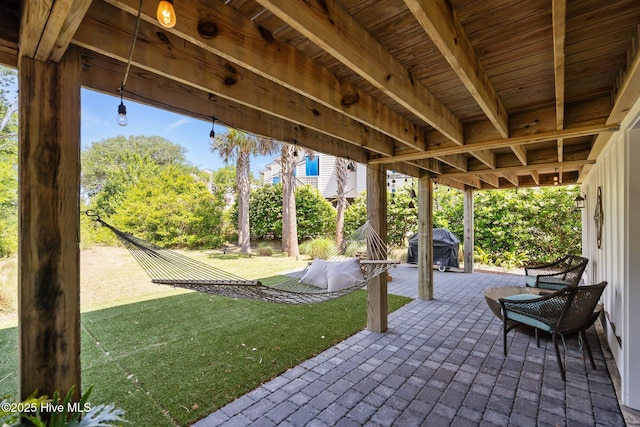 view of patio with a grill