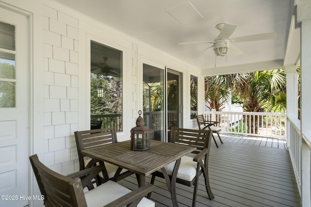 sunroom with ceiling fan and plenty of natural light