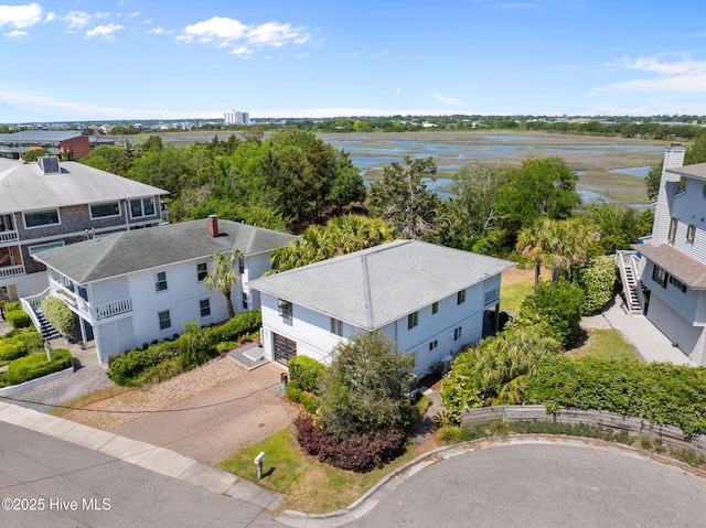 view of subject property with a large body of water