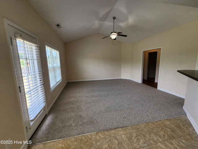 108 Hill Farm Dr, Richlands, NC 28574 - carpeted spare room with a ceiling fan, vaulted ceiling, and baseboards