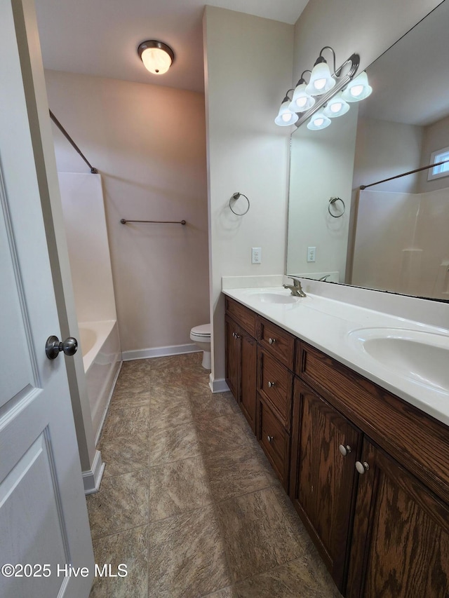108 Hill Farm Dr, Richlands, NC 28574 - full bathroom with toilet, double vanity, bathtub / shower combination, and baseboards