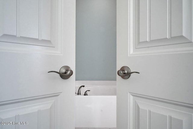 full bathroom with a bath