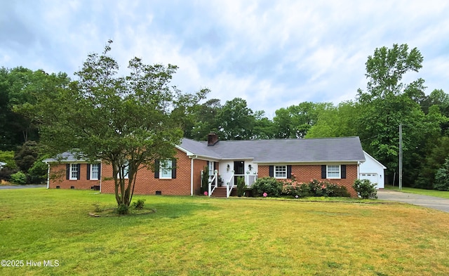 1120 Princeton Kenly Rd, Kenly, NC 27542 - single story home with brick siding, a front yard, a garage, and driveway