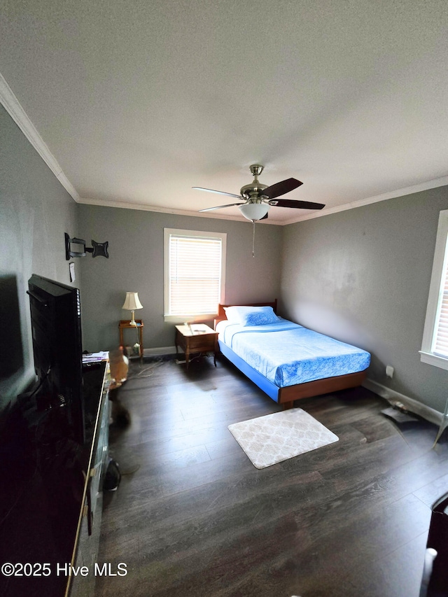 1120 Princeton Kenly Rd, Kenly, NC 27542 - bedroom with ornamental molding, wood finished floors, baseboards, and a ceiling fan