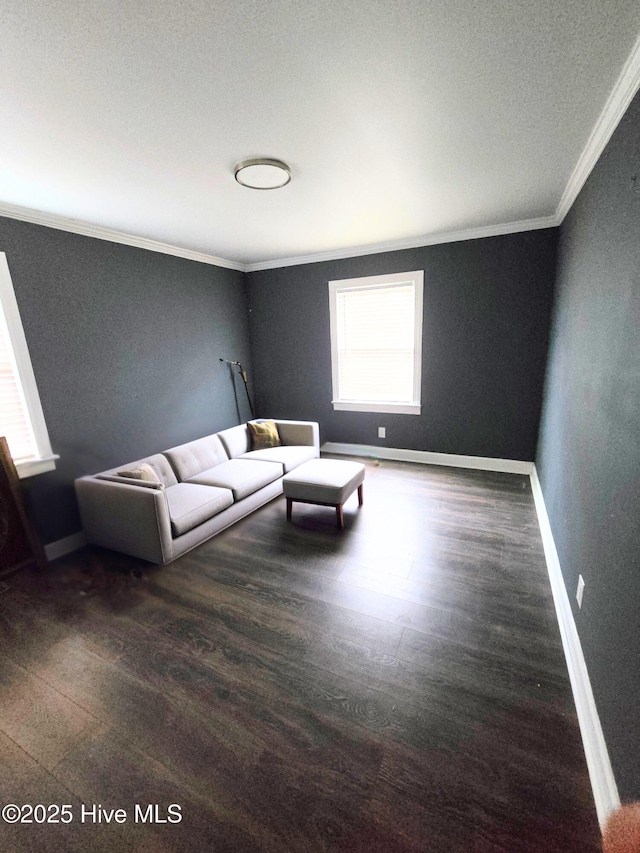 1120 Princeton Kenly Rd, Kenly, NC 27542 - living room featuring crown molding, wood finished floors, and baseboards