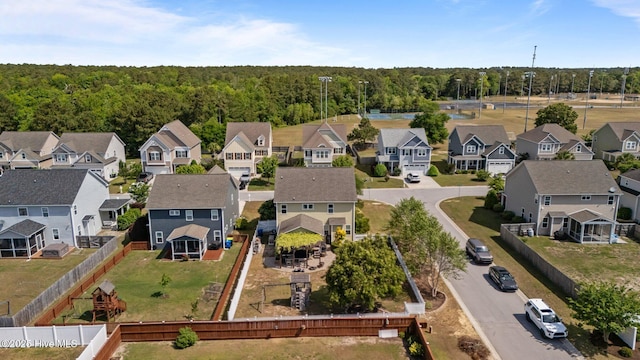 bird's eye view with a view of trees and a residential view