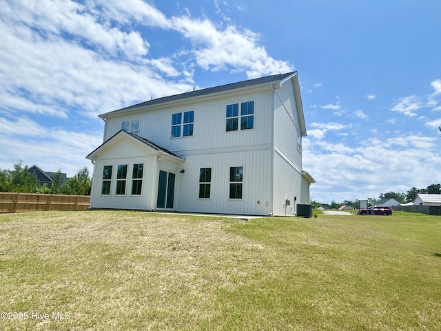 61 Tanglewood Ct, Hampstead, NC 28443 - rear view of house featuring central AC