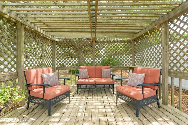 wooden terrace with a pergola and an outdoor living space