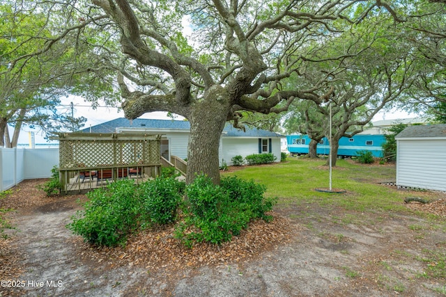 view of yard featuring a deck