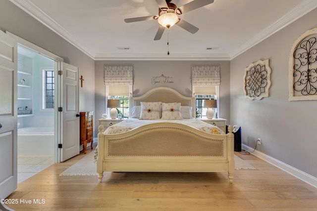 bedroom featuring crown molding, ensuite bath, and visible vents