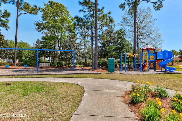 community jungle gym with a yard
