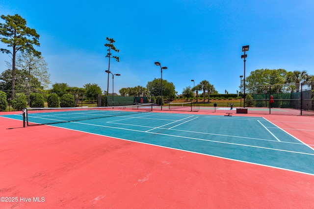 view of sport court with fence and community basketball court