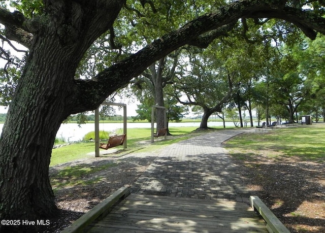 404 Sunset Oaks Ln, Sunset Beach, NC 28468 - view of property's community with a lawn