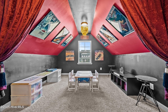 game room with lofted ceiling and carpet