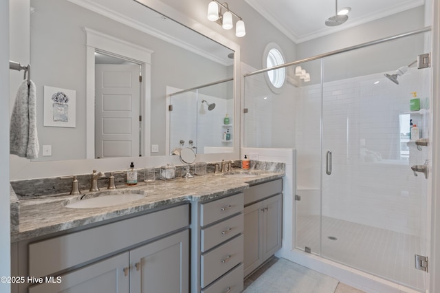 26 Seagull St Unit B, Wrightsville Beach, NC 28480 - full bath featuring a shower stall, crown molding, and double vanity