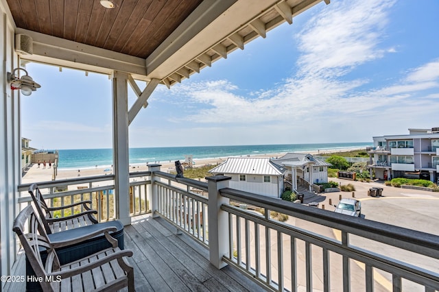 26 Seagull St Unit B, Wrightsville Beach, NC 28480 - wooden deck featuring view of water and beach