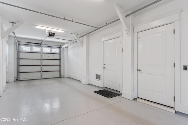 26 Seagull St Unit B, Wrightsville Beach, NC 28480 - garage with a garage door opener