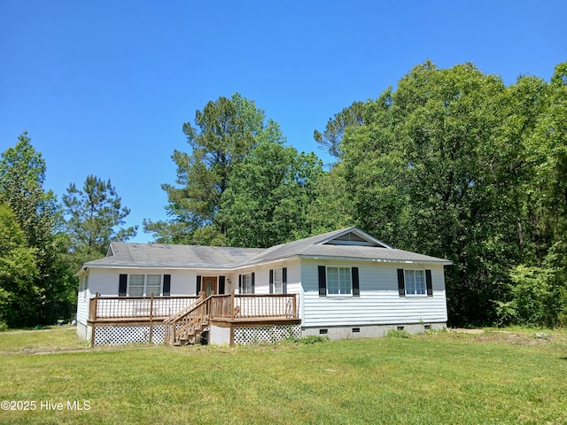 view of front of home featuring crawl space, a deck, and a front lawn