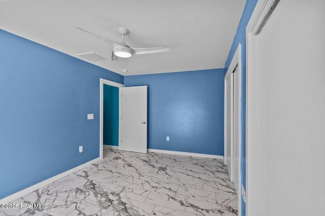 1718 Highland Dr, Washington, NC 27889 - unfurnished bedroom featuring baseboards, marble finish floor, a closet, and ceiling fan