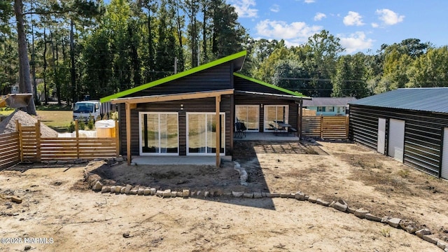 1718 Highland Dr, Washington, NC 27889 - back of property featuring a patio and fence