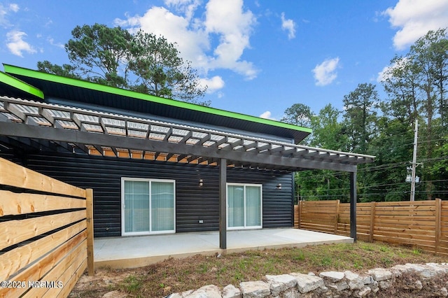 1718 Highland Dr, Washington, NC 27889 - back of house with a pergola, a patio area, and fence