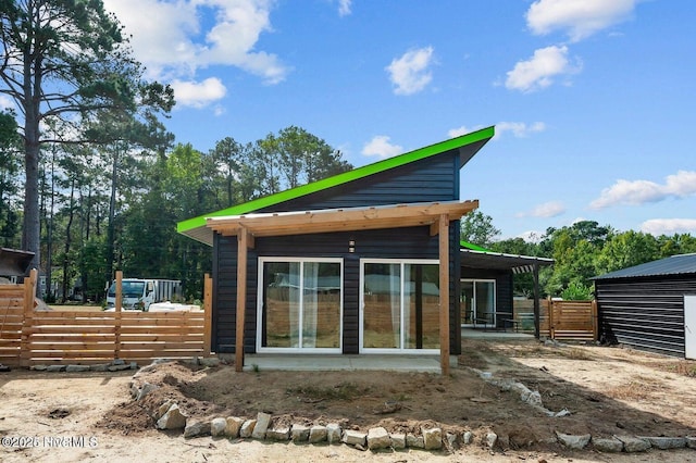 1718 Highland Dr, Washington, NC 27889 - rear view of house featuring fence