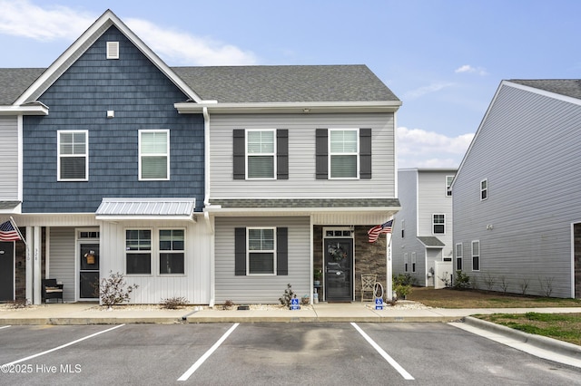 326 Starfish Ln, Sneads Ferry, NC 28460 - multi unit property featuring a shingled roof, covered porch, and uncovered parking